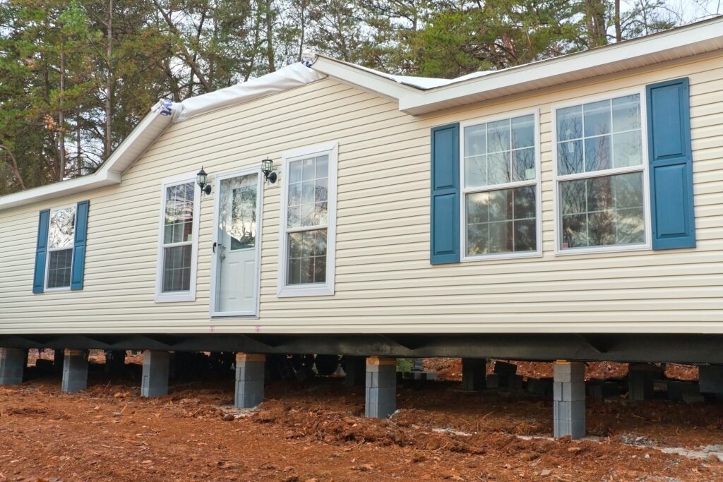 A picture of the wooden house installation with glass windows