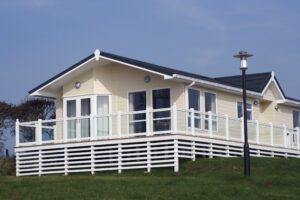 A Home With a White Color Fence